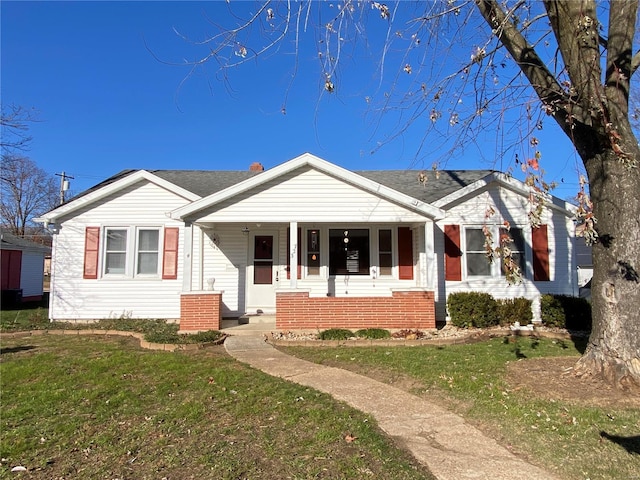 ranch-style home with a front lawn