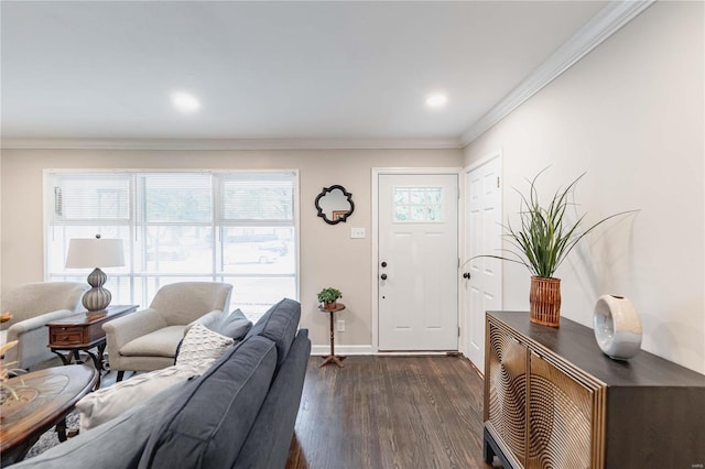 foyer entrance featuring crown molding and dark wood-type flooring