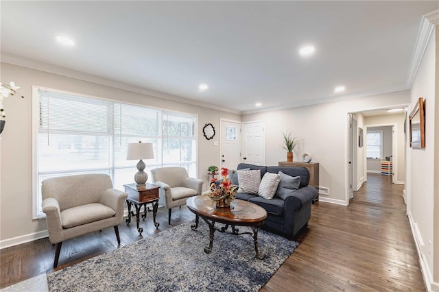 living room with dark hardwood / wood-style flooring and crown molding