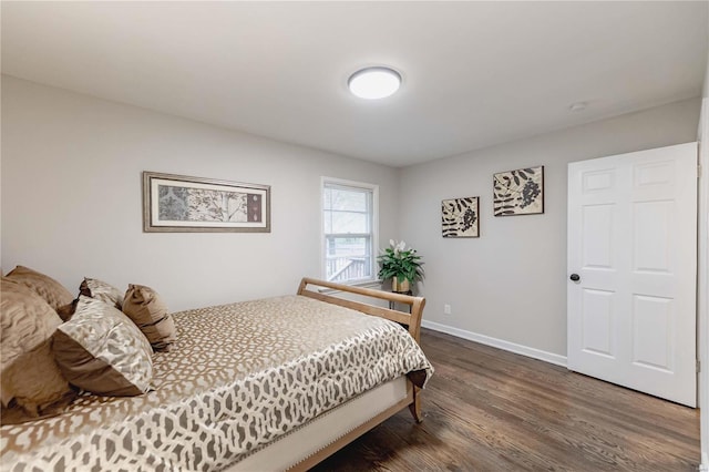 bedroom featuring dark hardwood / wood-style floors