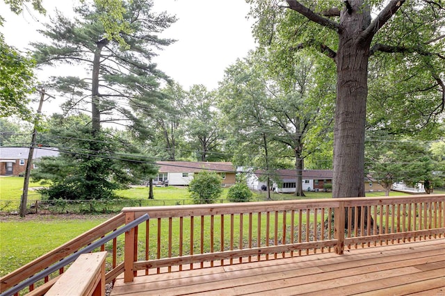 deck featuring a lawn