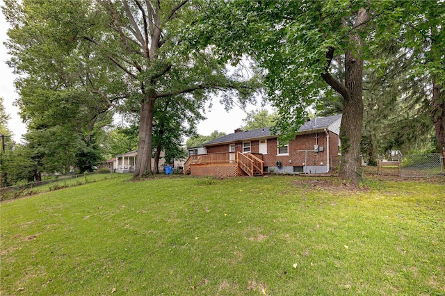 view of yard with a deck