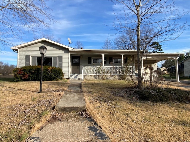 view of front of house featuring a carport