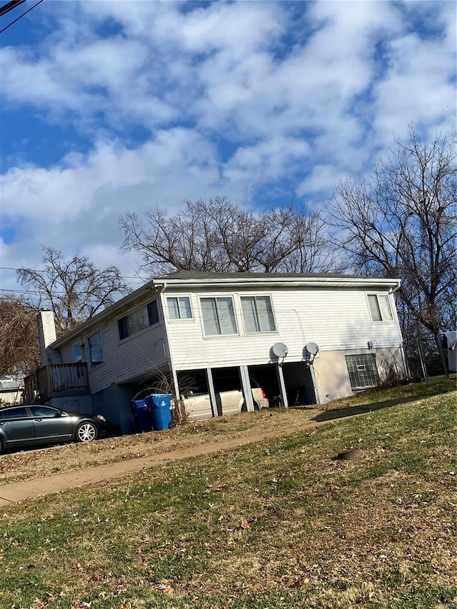 exterior space with a front yard