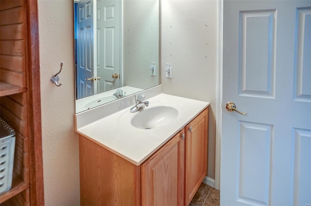 bathroom with vanity and tile patterned floors