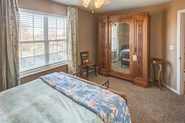 bedroom with carpet floors and ceiling fan