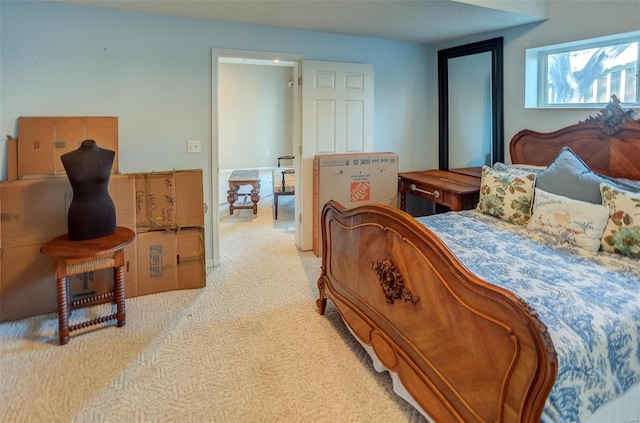 bedroom featuring light colored carpet