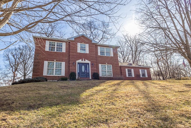 view of front of home with a front lawn