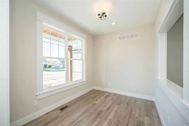 empty room featuring light hardwood / wood-style floors