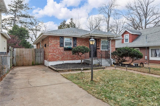 bungalow with a front yard