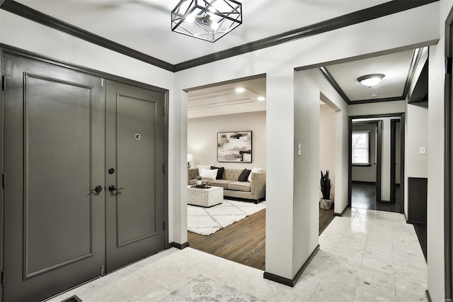 entrance foyer with crown molding