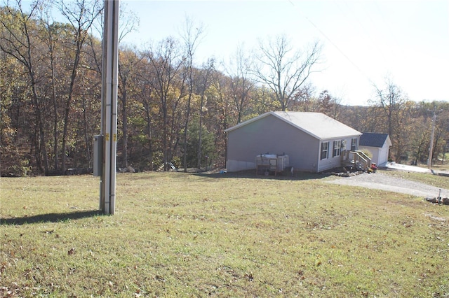 exterior space featuring a lawn