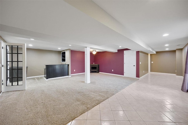 basement with light colored carpet