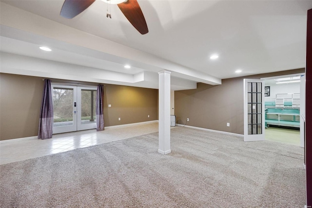 basement featuring ceiling fan, light carpet, and french doors