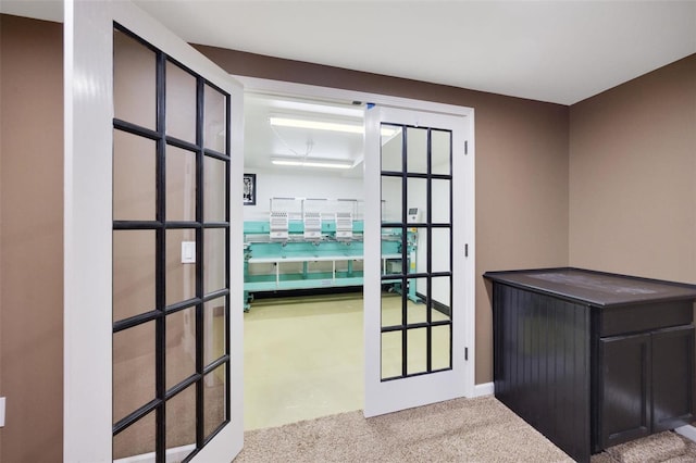 entryway featuring light colored carpet