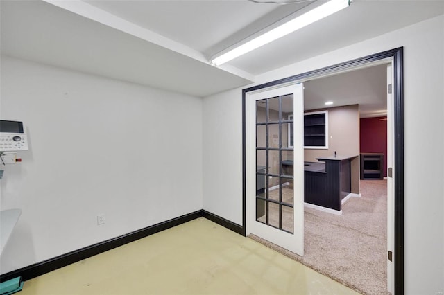 unfurnished room with carpet