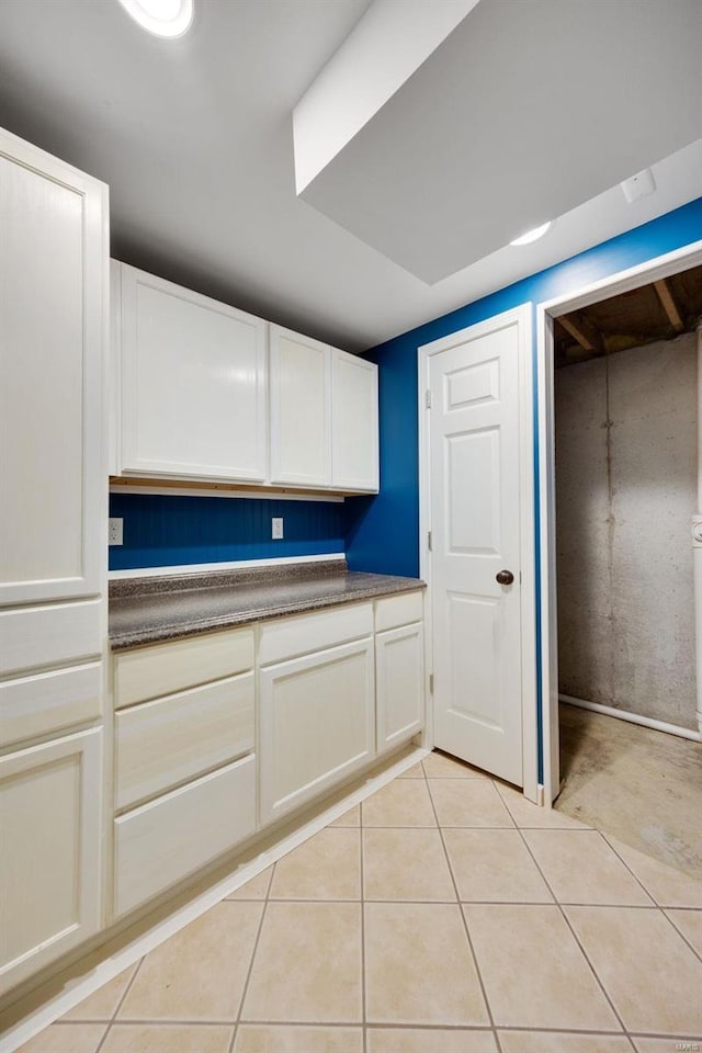 kitchen with light tile patterned floors