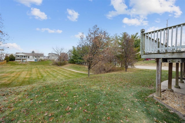 view of yard with a wooden deck