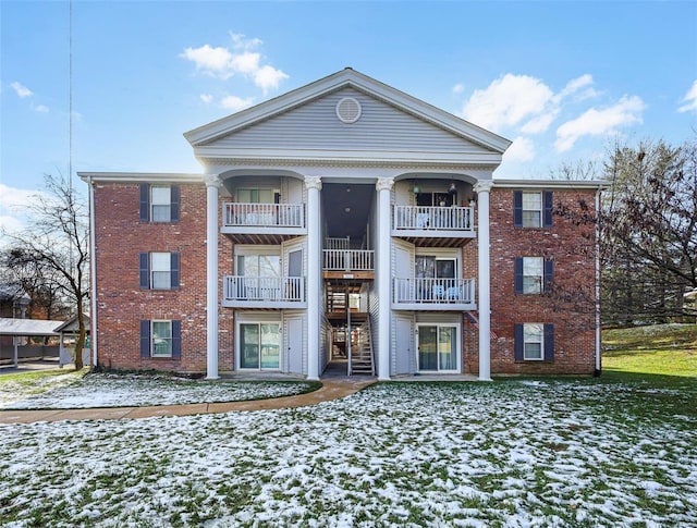 view of snow covered property