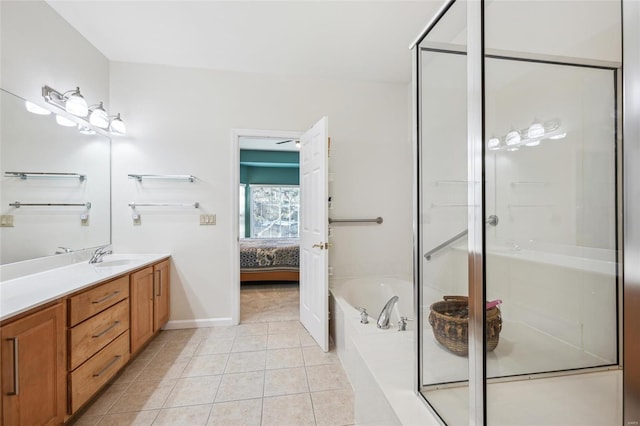 bathroom featuring vanity, tile patterned floors, and plus walk in shower