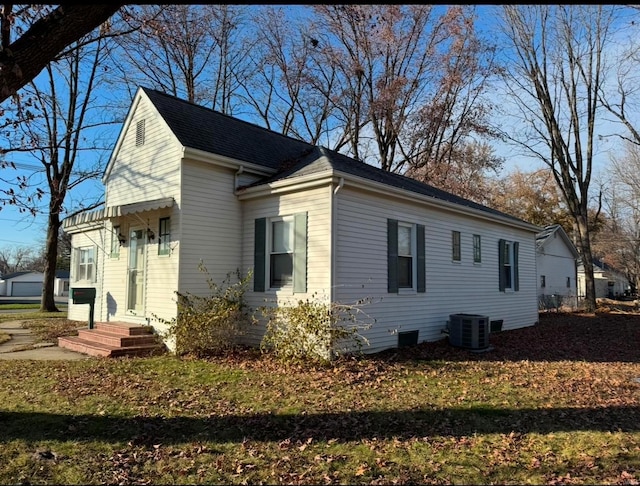 view of property exterior with central AC unit