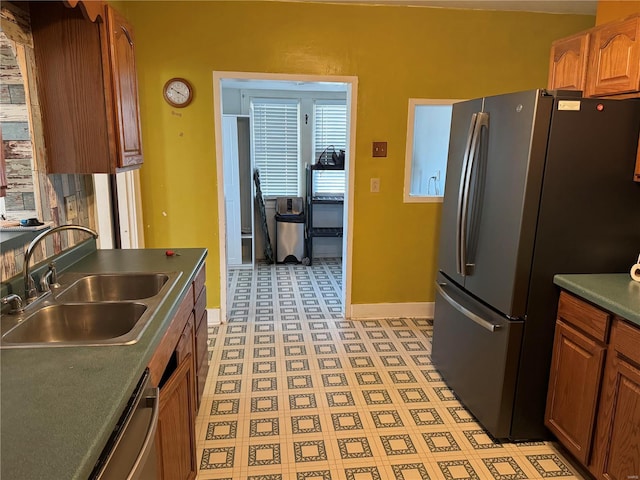 kitchen featuring sink and appliances with stainless steel finishes