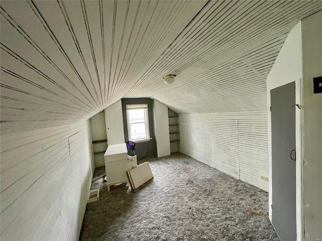 bonus room featuring wooden ceiling and vaulted ceiling