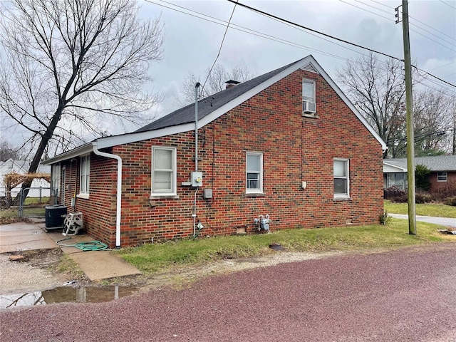 view of property exterior featuring central AC and cooling unit