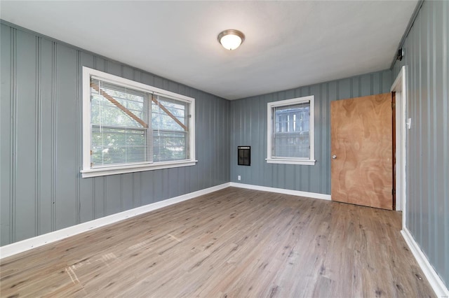 spare room with light wood-type flooring