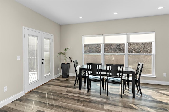 dining area featuring french doors and dark hardwood / wood-style floors