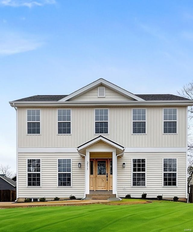 view of front facade with a front lawn