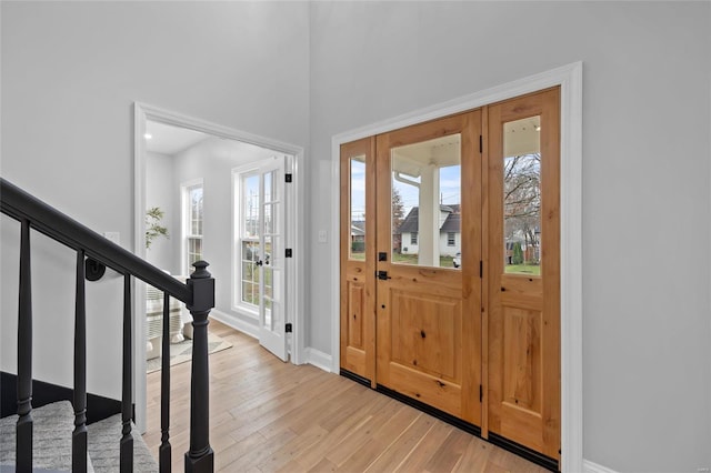 entrance foyer featuring light wood-type flooring