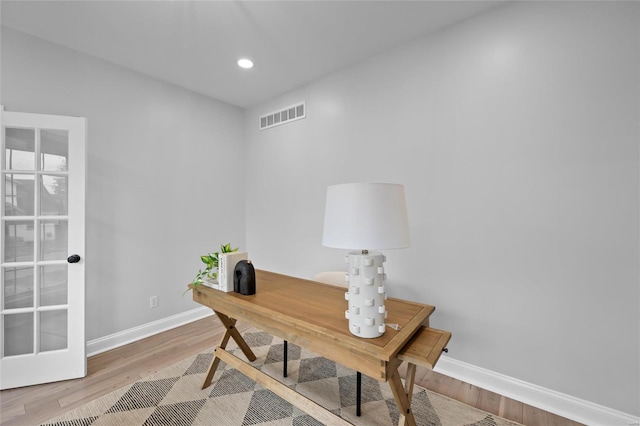 office area with light wood-type flooring