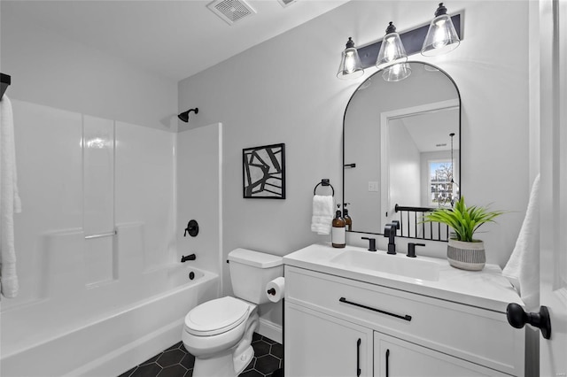 full bathroom with tile patterned flooring, vanity, toilet, and washtub / shower combination