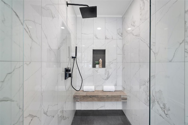 bathroom featuring tiled shower