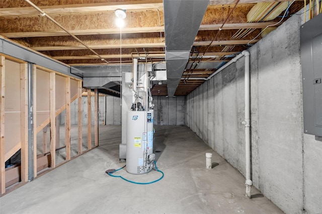 basement with electric panel and water heater