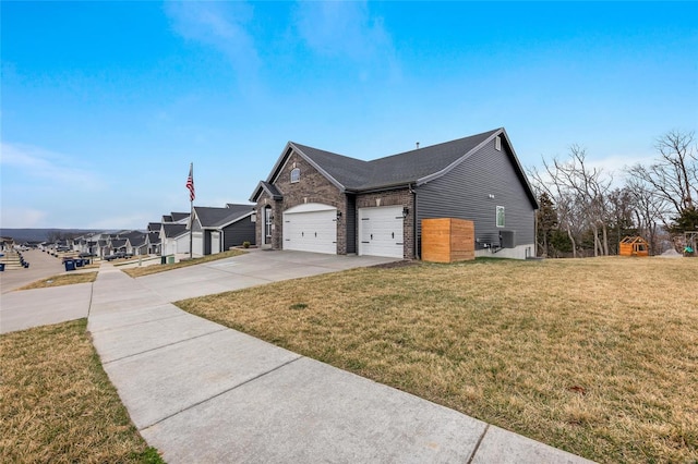 view of property exterior with a yard and a garage