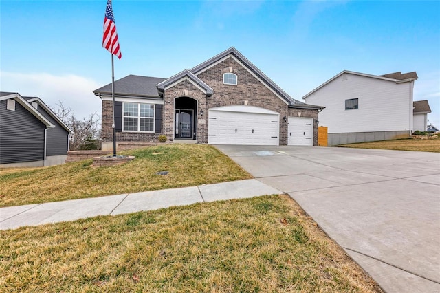 view of front facade featuring a front yard and a garage