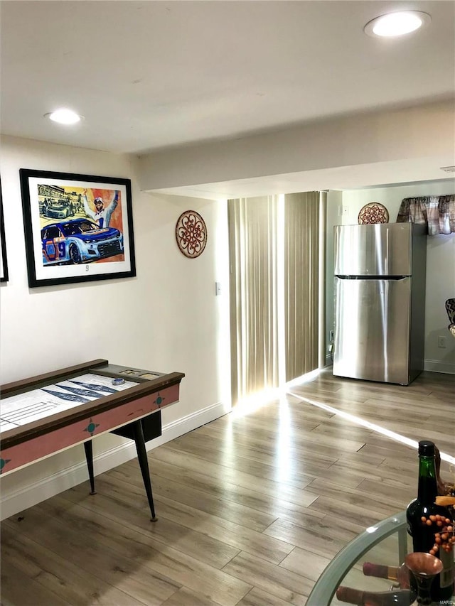 game room featuring hardwood / wood-style flooring