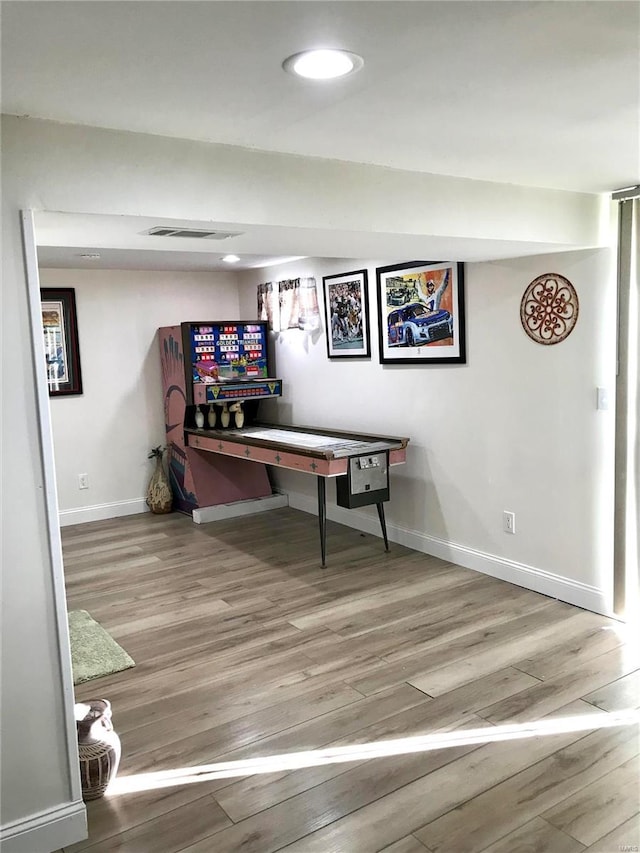 playroom featuring hardwood / wood-style flooring