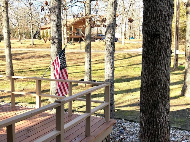 view of yard with a wooden deck