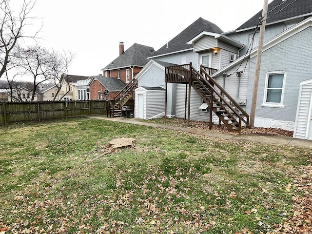 view of yard featuring a wooden deck