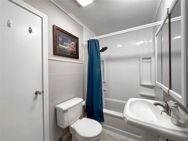 full bathroom with sink, shower / bathtub combination with curtain, crown molding, toilet, and tile walls