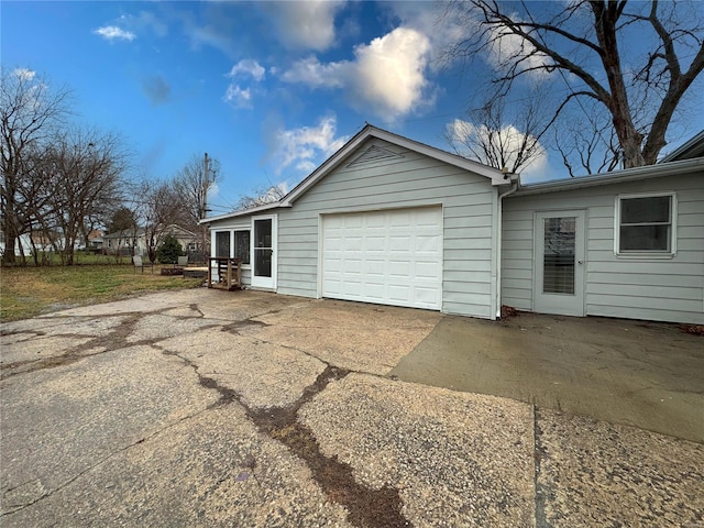 exterior space with a garage