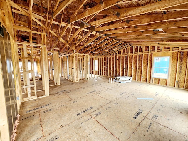 misc room with lofted ceiling