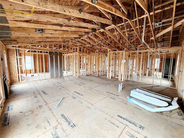 misc room with lofted ceiling