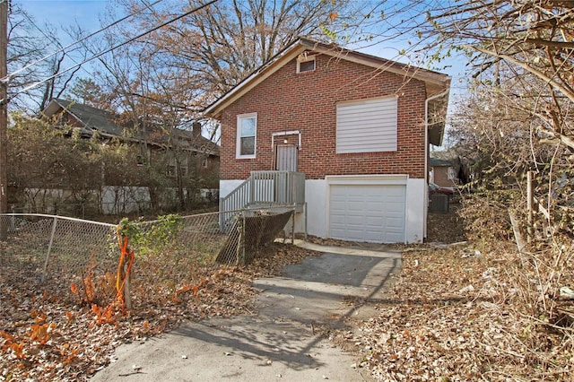 view of front of home featuring a garage