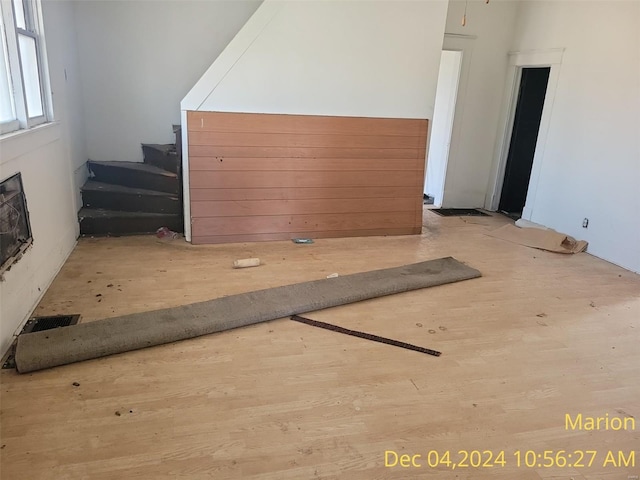 unfurnished room with light hardwood / wood-style floors