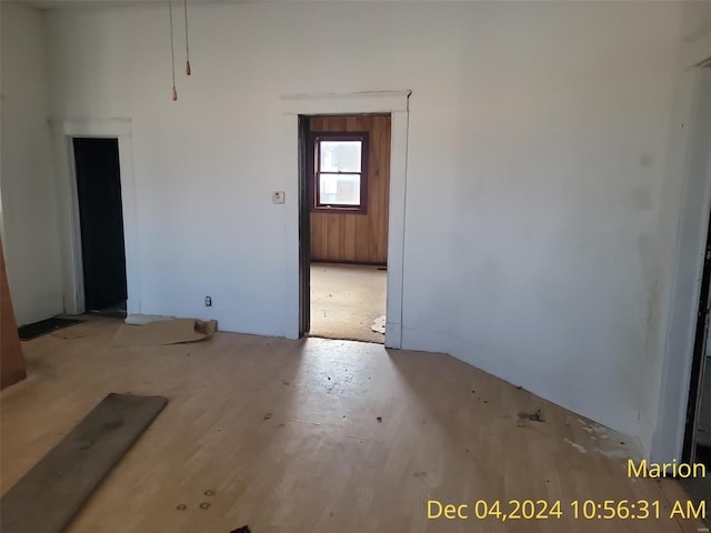 empty room with light hardwood / wood-style flooring