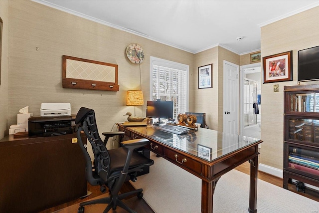 home office featuring crown molding and hardwood / wood-style floors